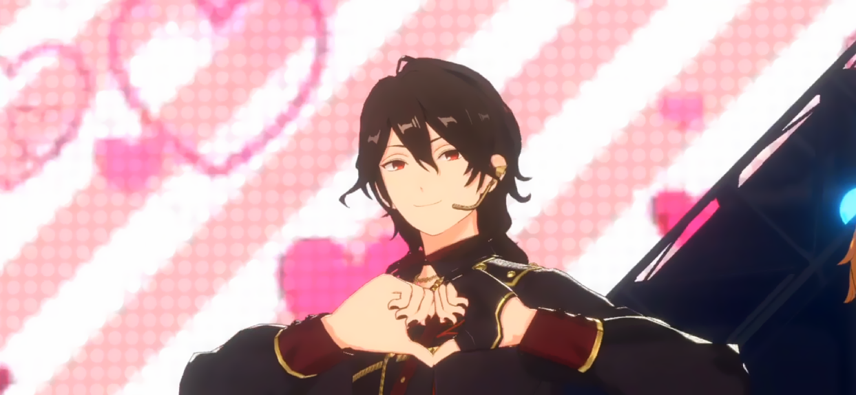 A music video screenshot of Rei making heart hands.