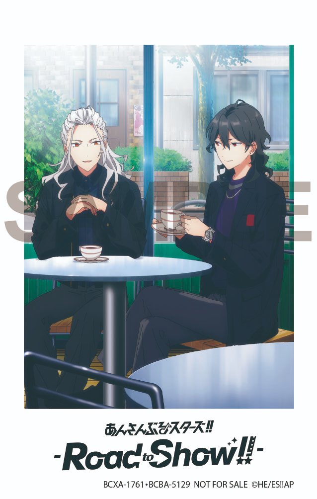 Nagisa and Rei sitting at a cafe table drinking coffee and chatting.